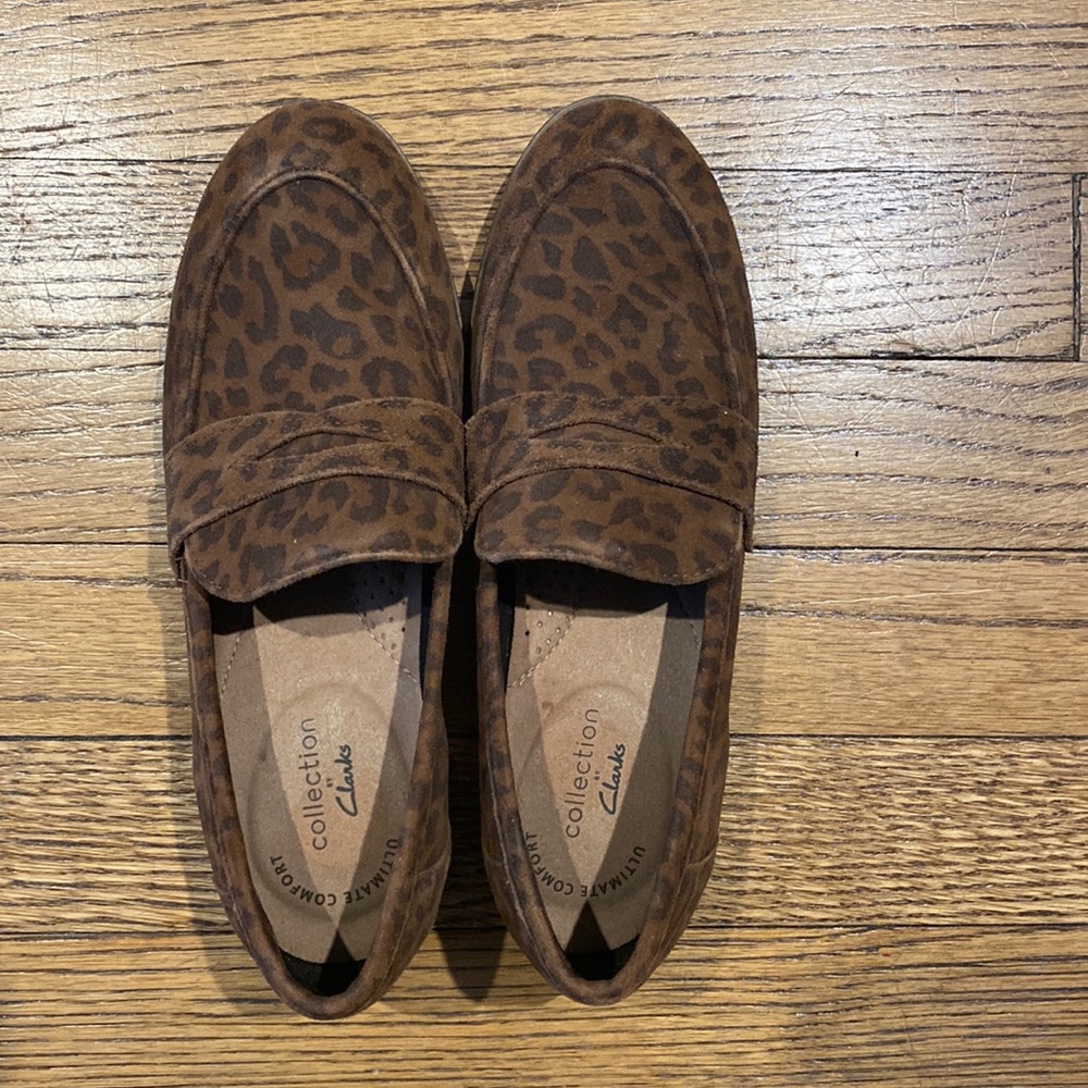 Clark animal print suede textured penny loafers.